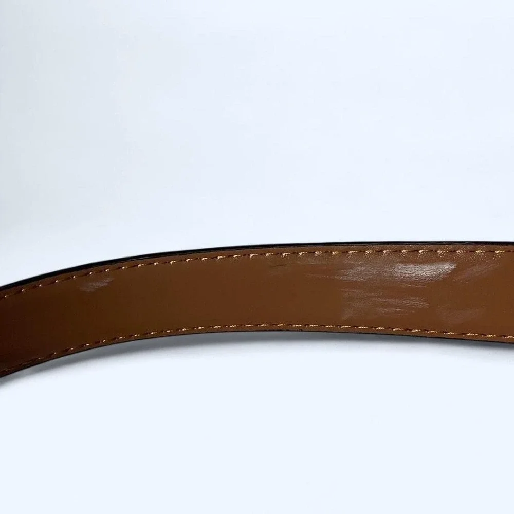 Black leather belt with silver buckle by Kemisant